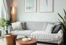 a living room filled with furniture and a large window